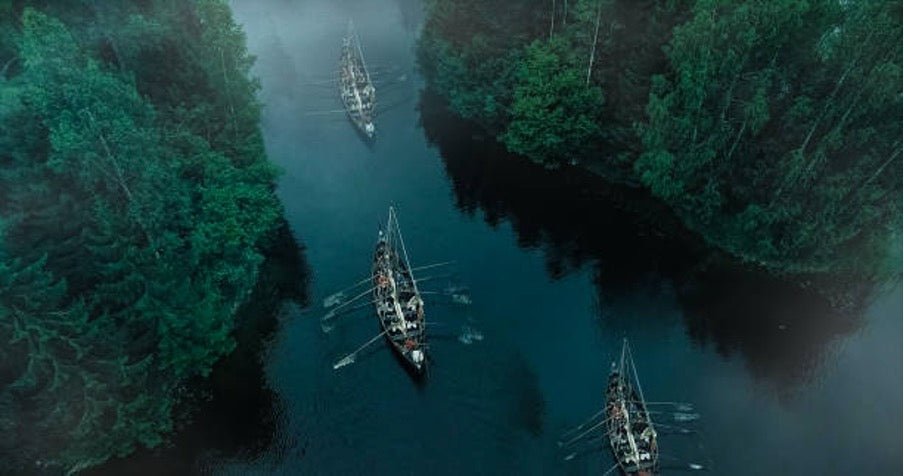 Viking Longships on a River